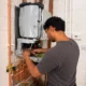 Technician-Repairing-Wall-Mounted-Boiler